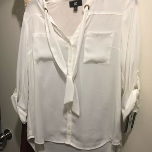 White button down long sleeve shirt.